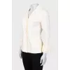 Yellow jacket with ruffles on the sleeves