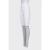 White high-waist shorts with a zipper