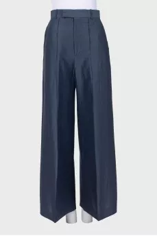 Wide-leg trousers with creases and tag