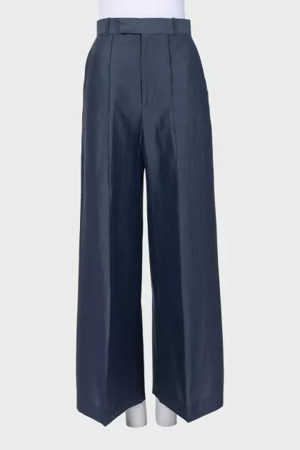 Wide-leg trousers with creases and tag