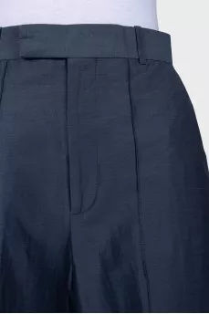 Wide-leg trousers with creases and tag
