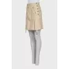 Button-down mini skirt with tag