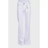 White flared trousers with a mid-rise