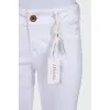 White flared trousers with a mid-rise