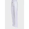 White flared trousers with a mid-rise
