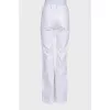 White flared trousers with a mid-rise