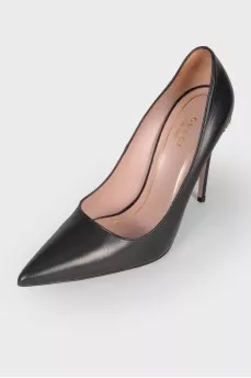 Black leather stilettos with a sharp toe