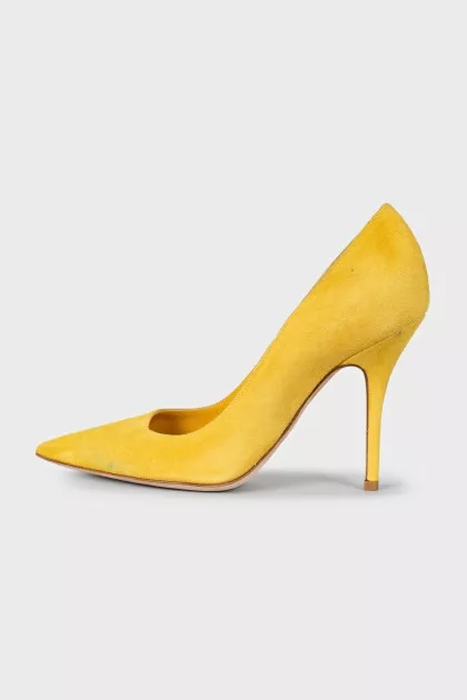 Yellow suede pumps