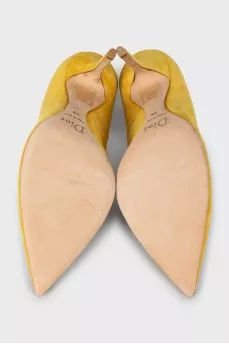 Yellow suede pumps