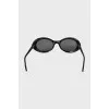 Oval sunglasses with black frames