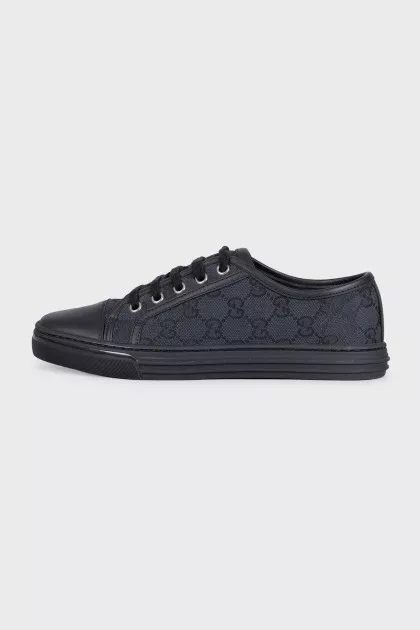 Black leather sneakers with textile inserts