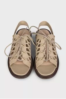 Leather sandals with an openwork pattern