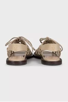 Leather sandals with an openwork pattern
