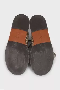 Leather sandals with an openwork pattern