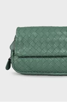 Leather bag with a chain and braided pattern