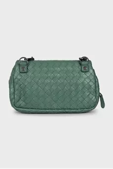 Leather bag with a chain and braided pattern