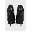 Black textured leather heels