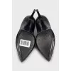 Black textured leather heels