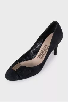 Black suede shoes with a bow
