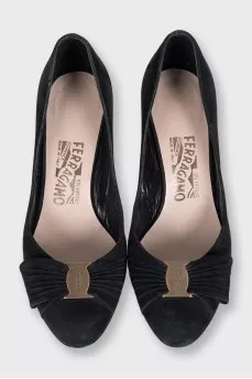Black suede shoes with a bow