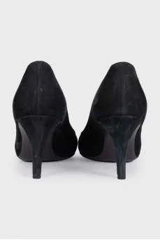 Black suede shoes with a bow