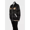 Insulated bomber jacket decorated with embroidery