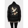 Insulated bomber jacket decorated with embroidery