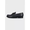 Black leather loafers with logo
