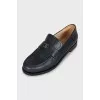Black leather loafers with logo