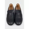 Black leather loafers with logo