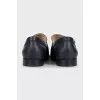 Black leather loafers with logo
