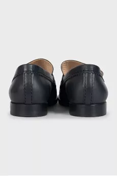Black leather loafers with logo