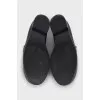 Black leather loafers with logo