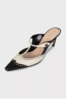 Beige leather mules decorated with perforations