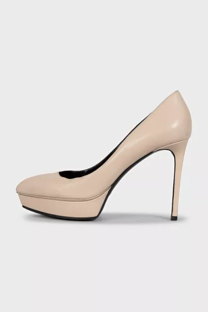 Beige high-heeled pumps