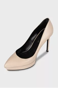 Beige high-heeled pumps
