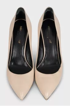 Beige high-heeled pumps