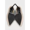 Beige high-heeled pumps