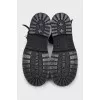 High boots made of distressed leather
