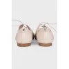 Leather lace-up shoes with tag