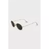 Green sunglasses with gold frames