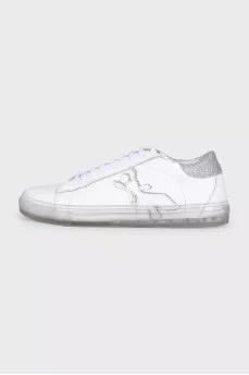 Leather sneakers decorated with glitter