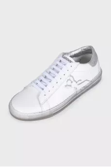 Leather sneakers decorated with glitter