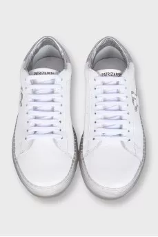 Leather sneakers decorated with glitter