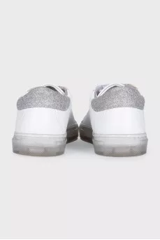 Leather sneakers decorated with glitter