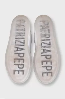 Leather sneakers decorated with glitter