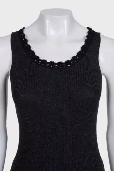 A tight-fitting black tank top with lace trim