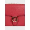 Red leather bag with gold logo