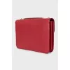 Red leather bag with gold logo