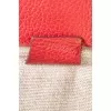 Red leather bag with gold logo
